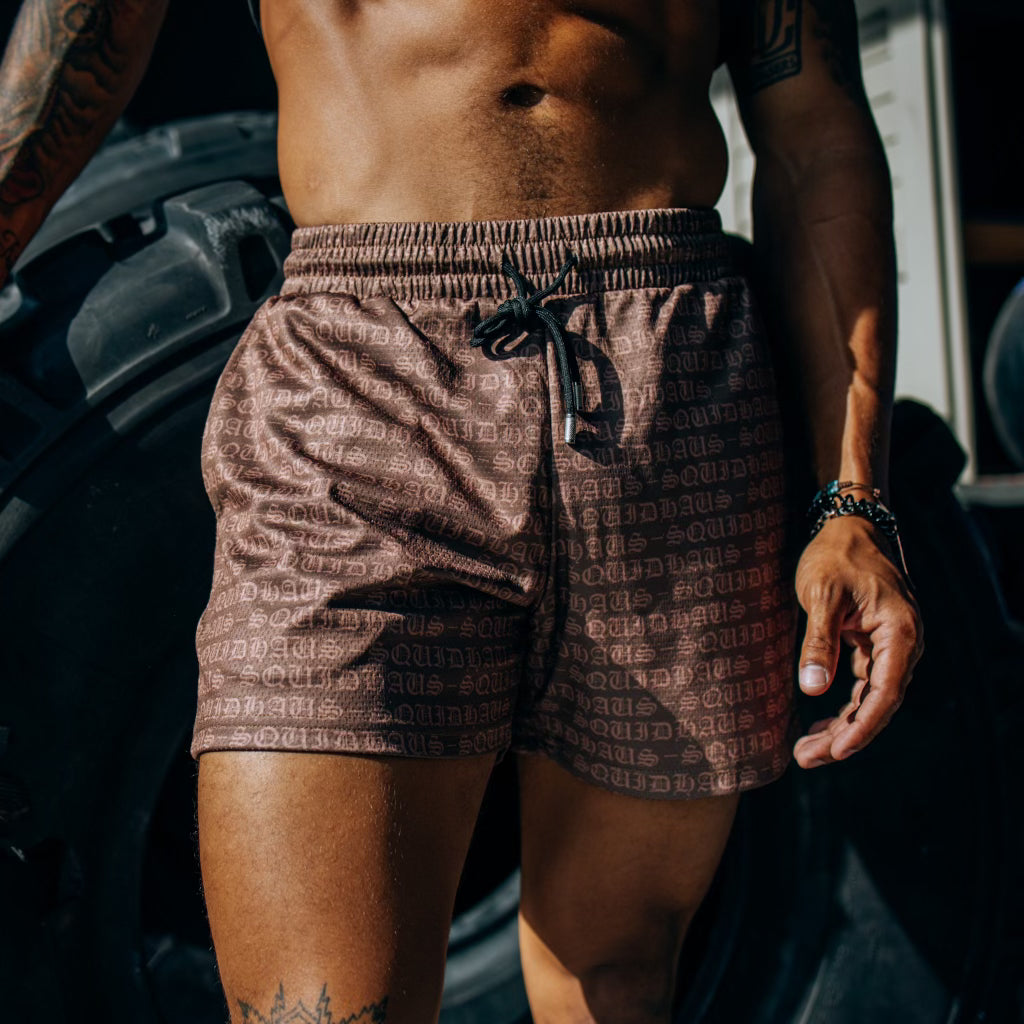 An athlete wearing 4 inch inseam mesh shorts in brown, from SquidHaus